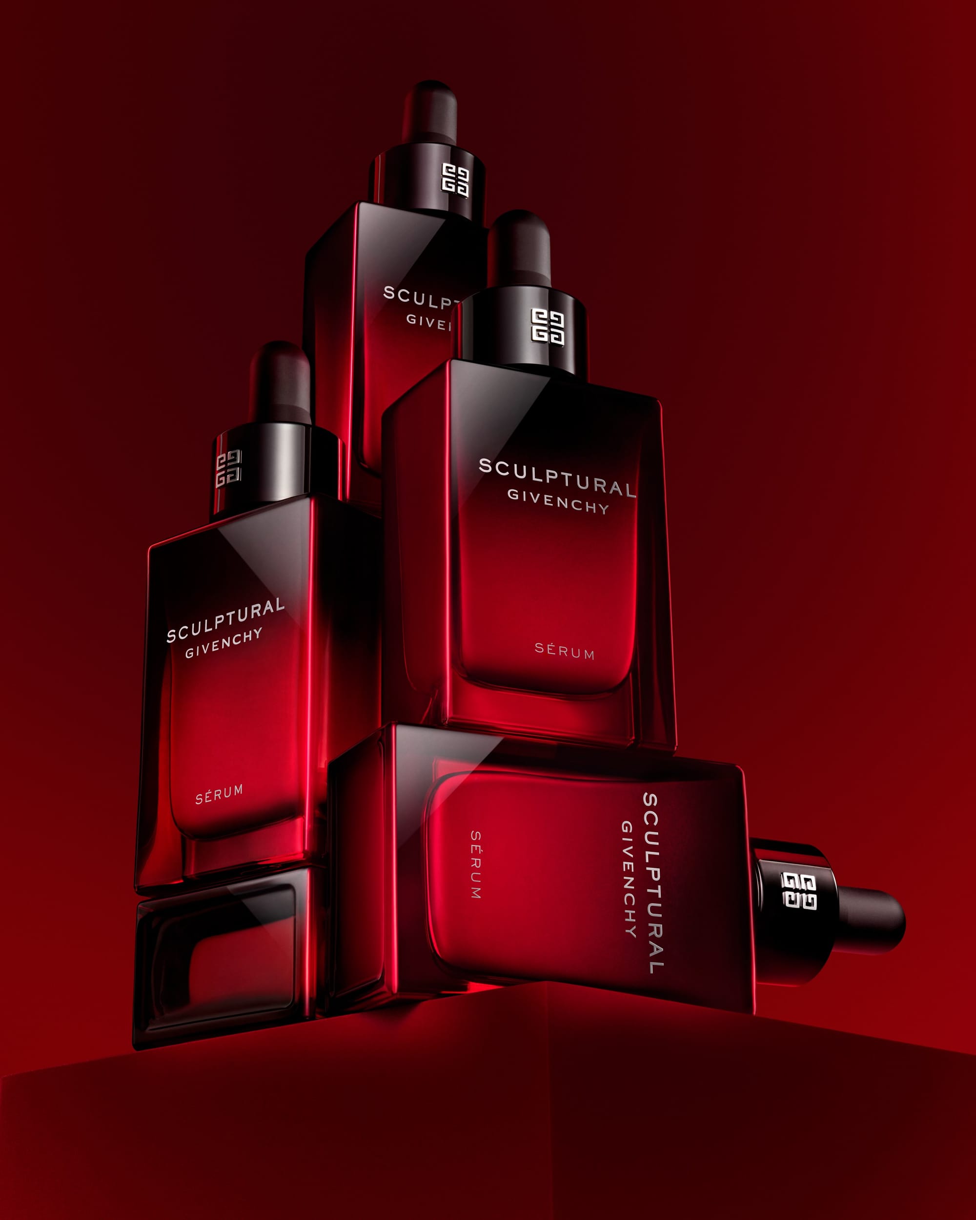 Givenchy Sculptural Serum product photo: deep red and black, glass, dramatic light, image 2 of 3
