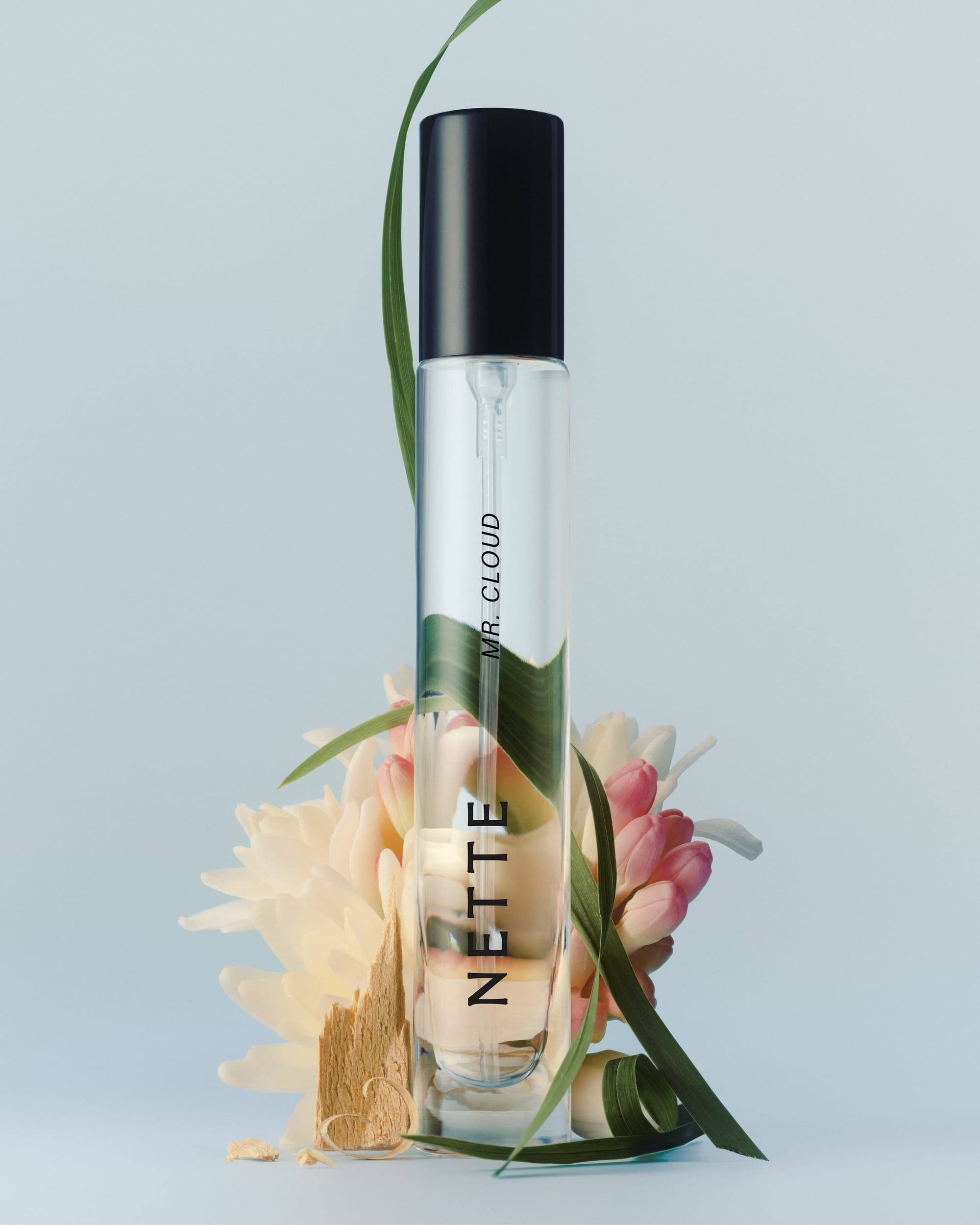 NETTE Mr. Cloud product photo: clear glass and black cap, glass and organic, soft light, image 3 of 4