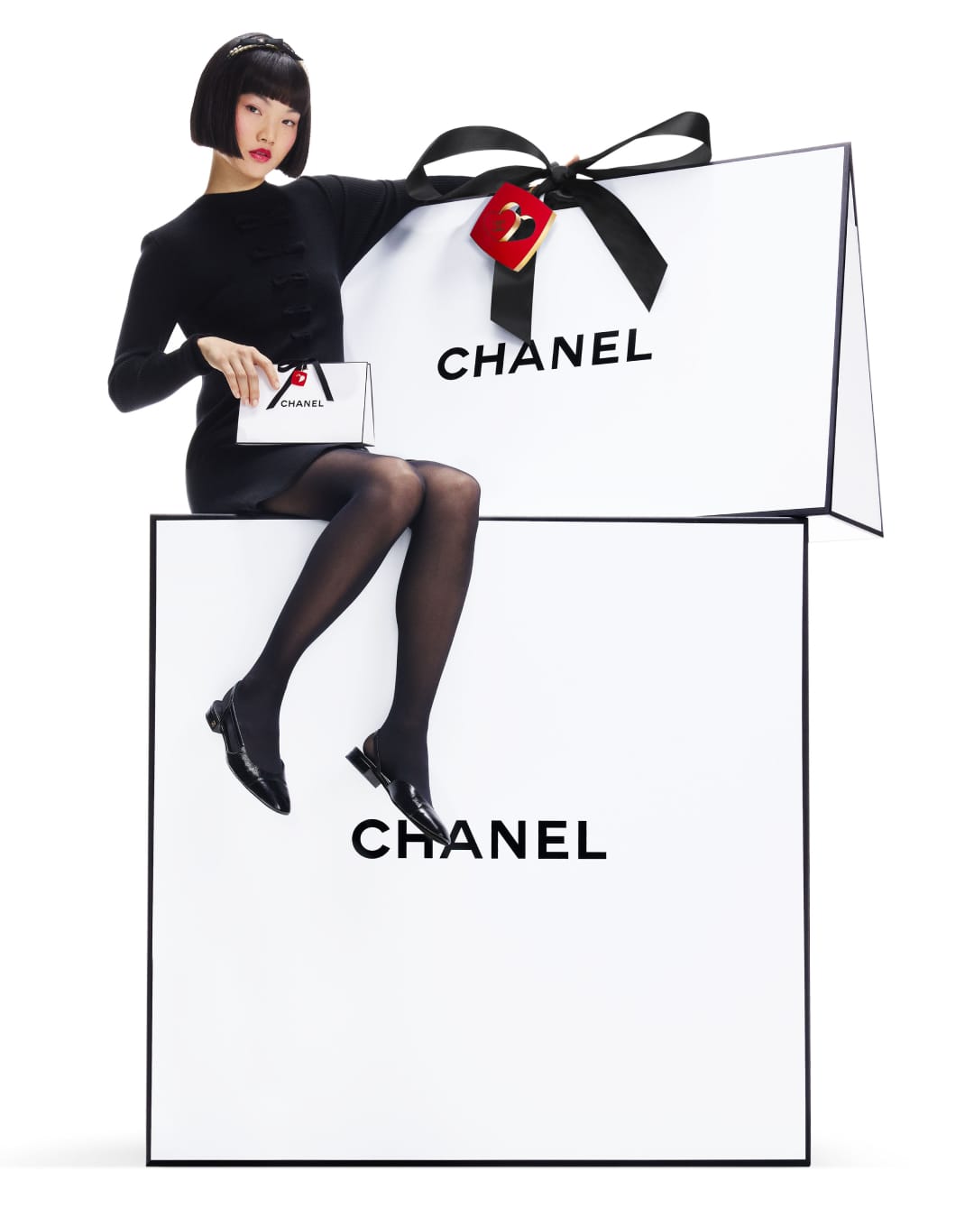 CHANEL fragrance product photo: black, violet, white and gold, glass, bright light, image 1 of 4