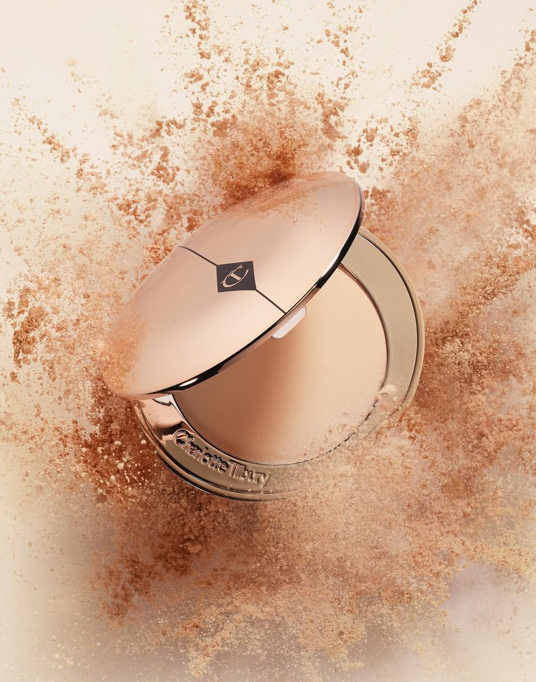 Charlotte Tilbury product photo: champagne beige, rose gold and bronze, metal, soft light