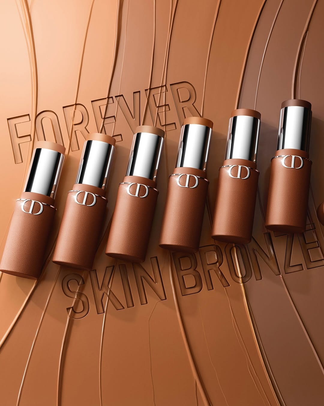 Dior Forever product photo: bronze, chrome silver and black, leather, soft light, image 2 of 5