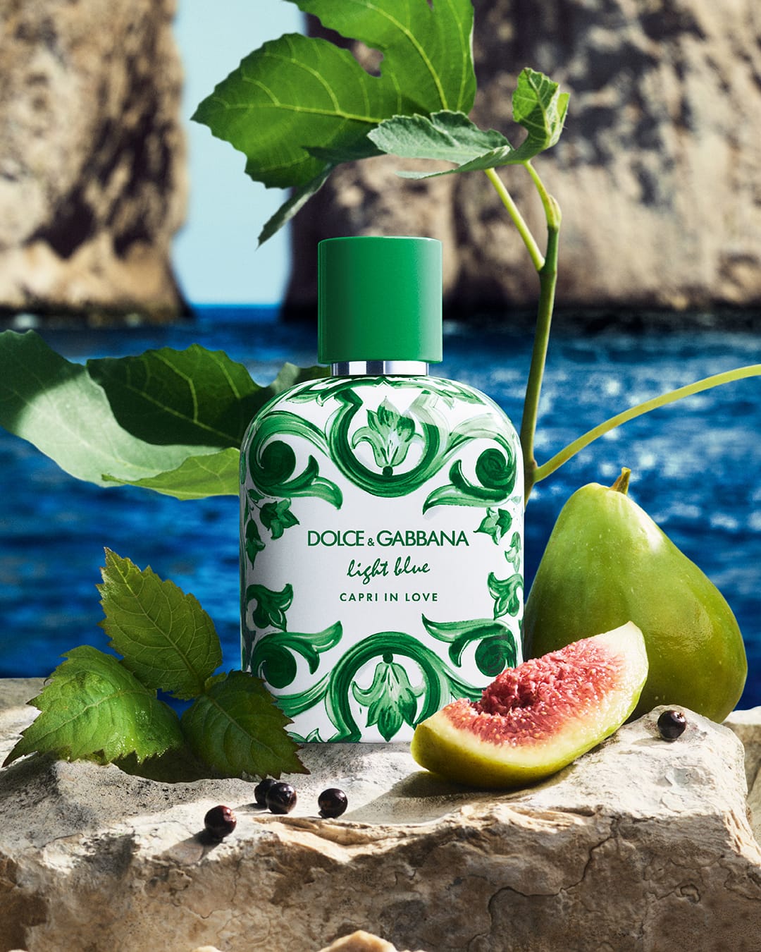 Dolce&Gabbana Beauty fragrance product photo: porcelain white, emerald green, coral pink and raspberry red, glass and stone, natural light