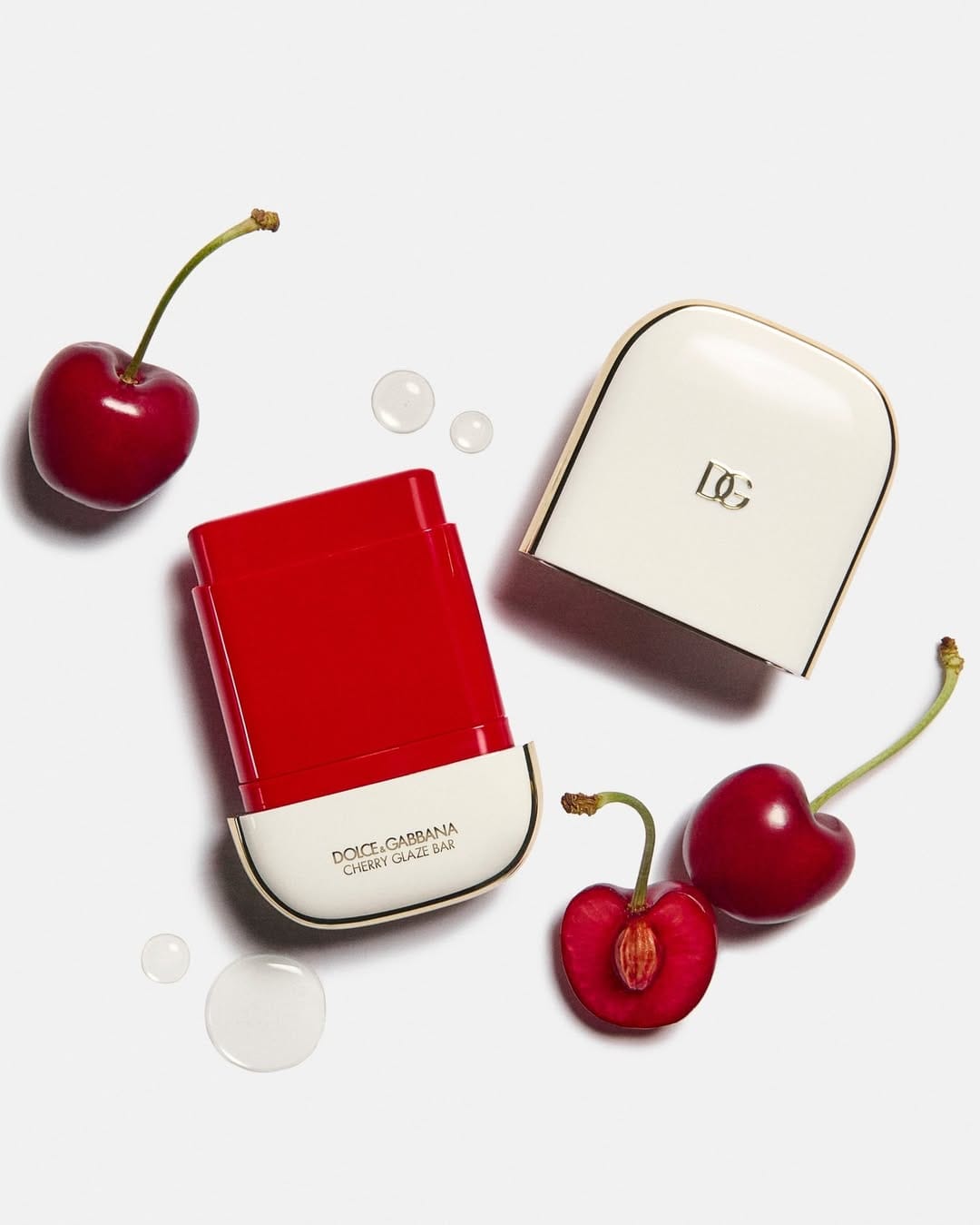Dolce&Gabbana Beauty product photo: cherry red, hot pink and coral orange, plastic, studio light