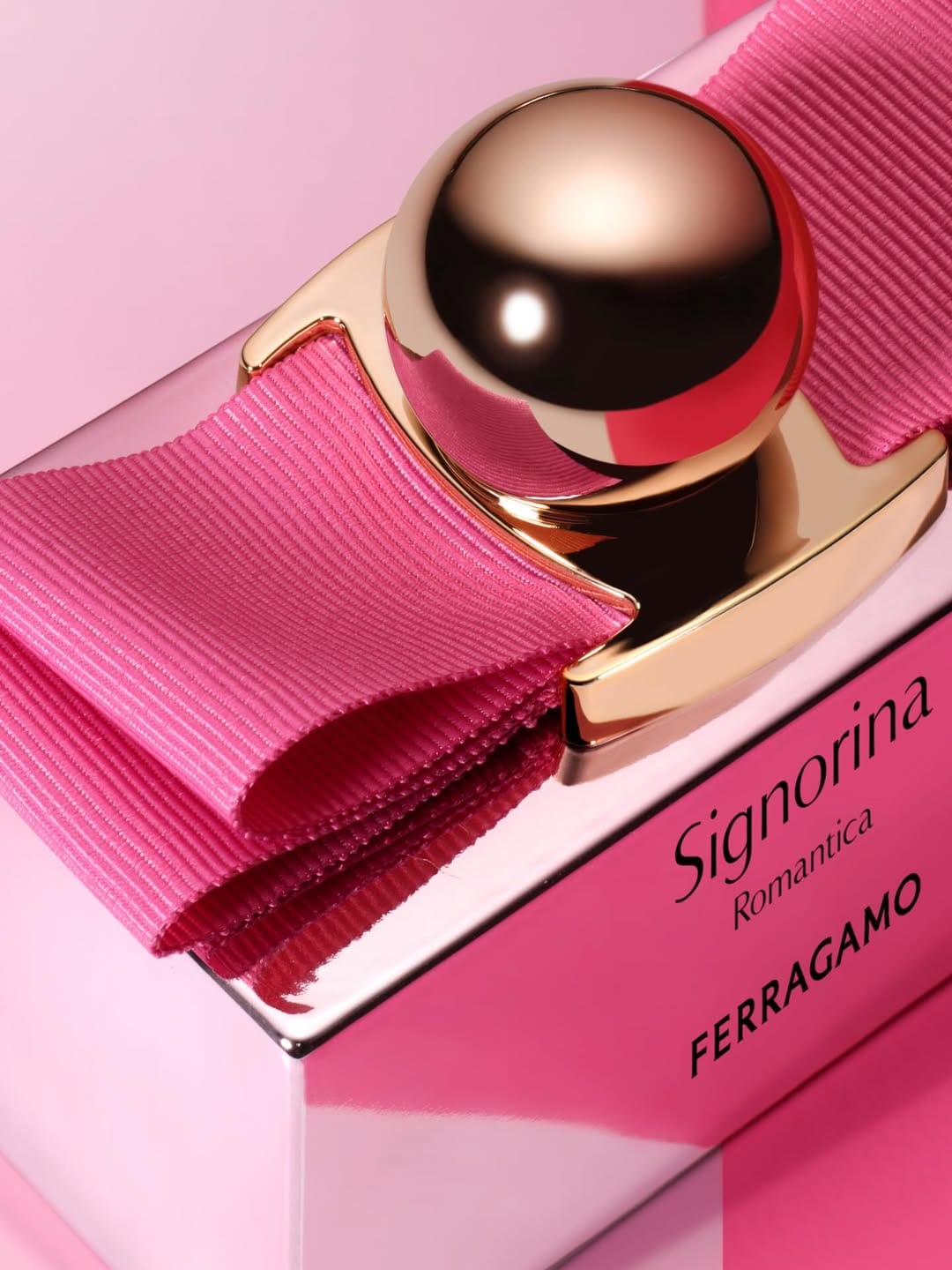 Ferragamo Signorina product photo: bubblegum pink and rose gold, metal and fabric, studio light