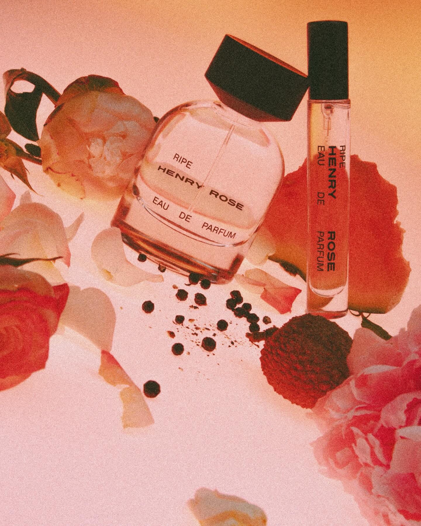 Henry Rose Ripe product photo: clear glass, black cap and blush pink, glass, soft light
