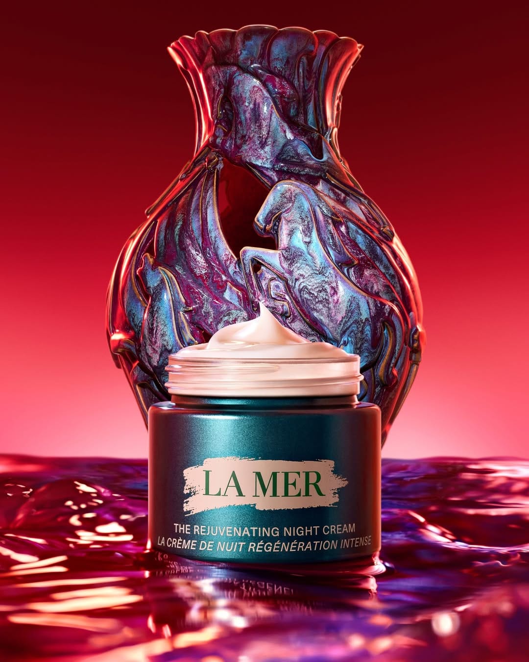 La Mer Lunar New Year product photo: teal green and cream white, glass, dramatic light