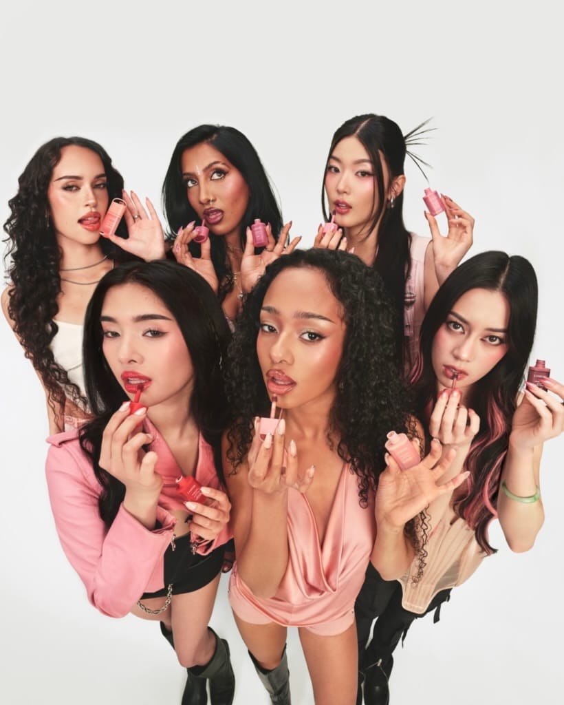 LANEIGE lip tint product photo: rosy pink and coral red, skin, soft light