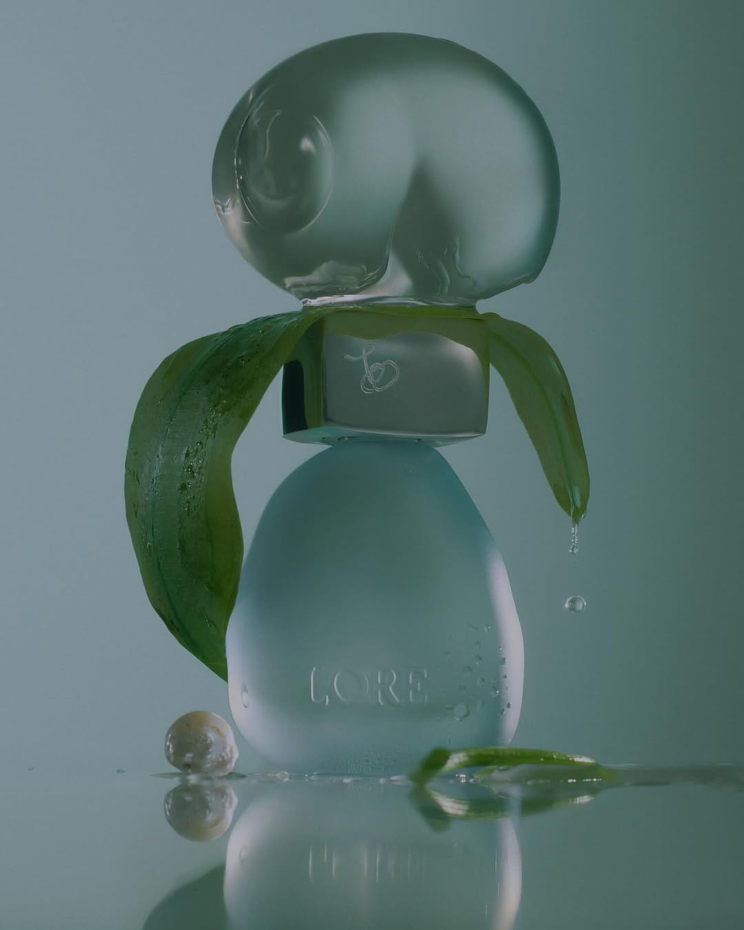 LORE Sublimity product photo: frosted sea glass, seafoam and clear glass, glass, soft light