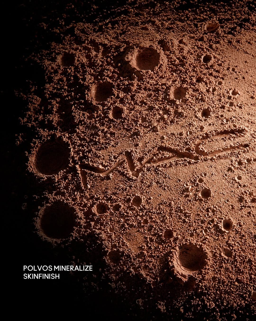 MAC Cosmetics moon landing campaign product photo: jet black, launch red, chrome silver and bronzer brown, metal and fabric, dramatic light, image 3 of 3