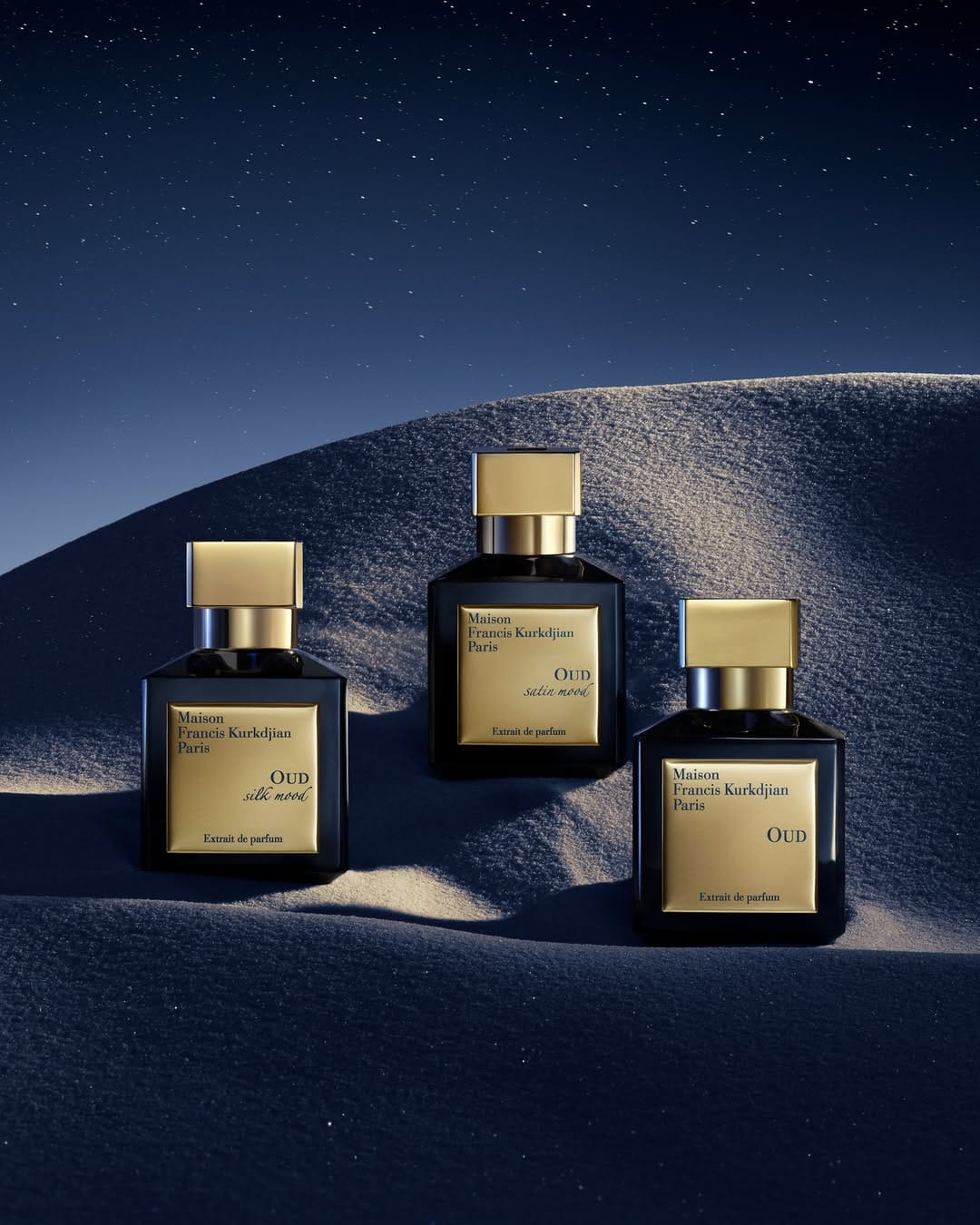 Maison Francis Kurkdjian product photo: black, gold and midnight blue, glass, soft light