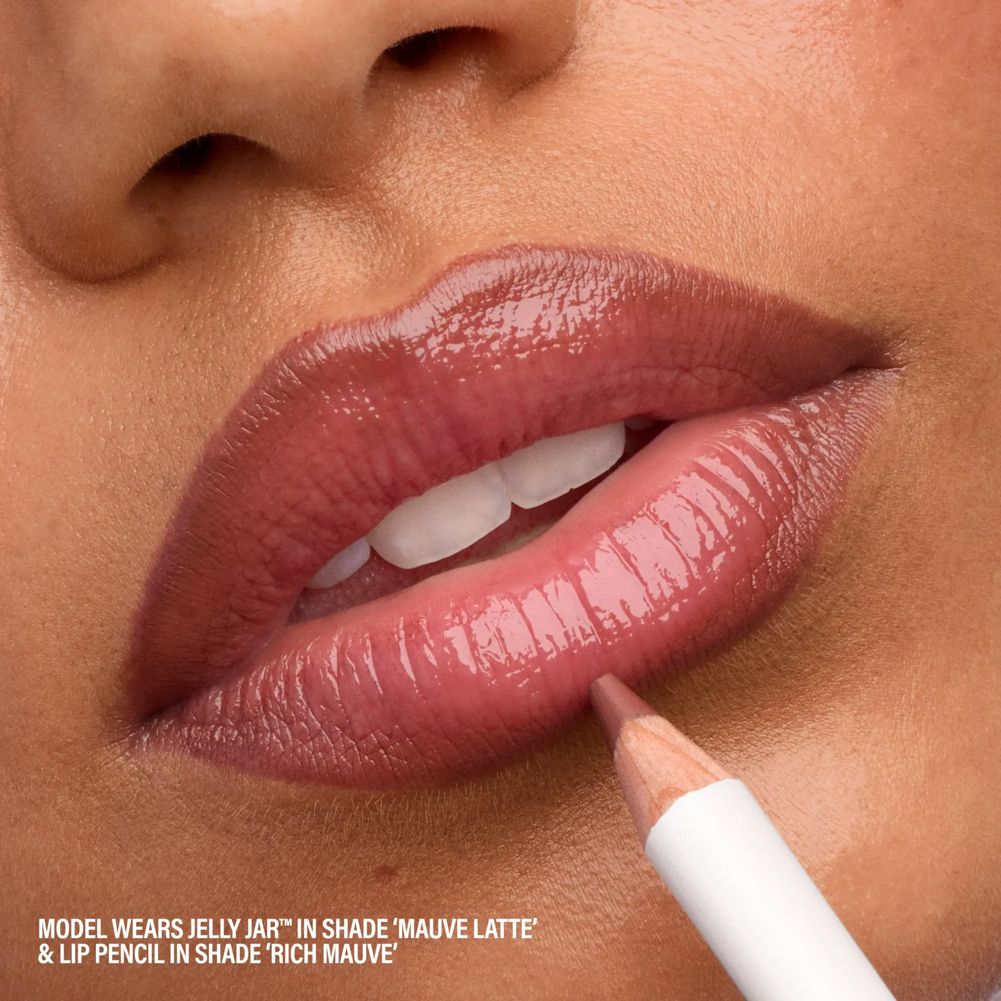 Makeup by Mario's jelly balm product photo: coral pink and cherry red, glass, soft light, image 5 of 8