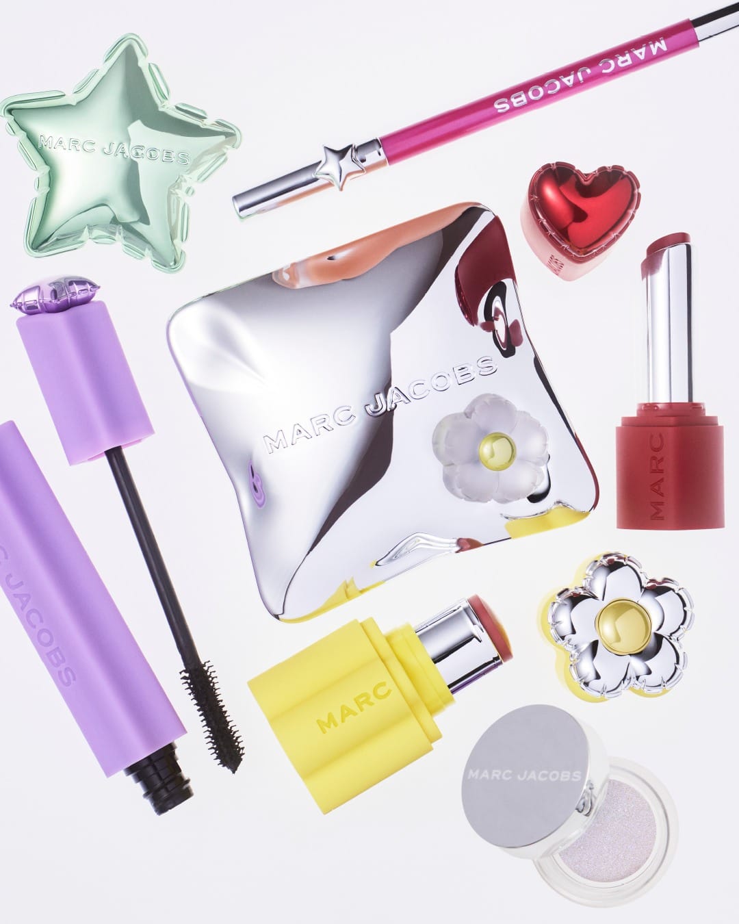 Marc Jacobs Beauty product photo: chrome silver, lavender, lemon yellow and cherry red, metal and plastic, bright light