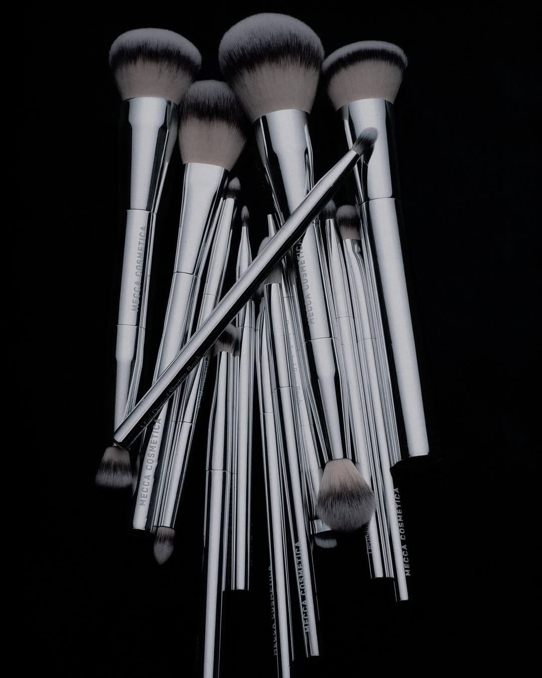 Mecca Cosmetica product photo: chrome silver, black, berry pink and rosewood, metal, studio light, image 5 of 6