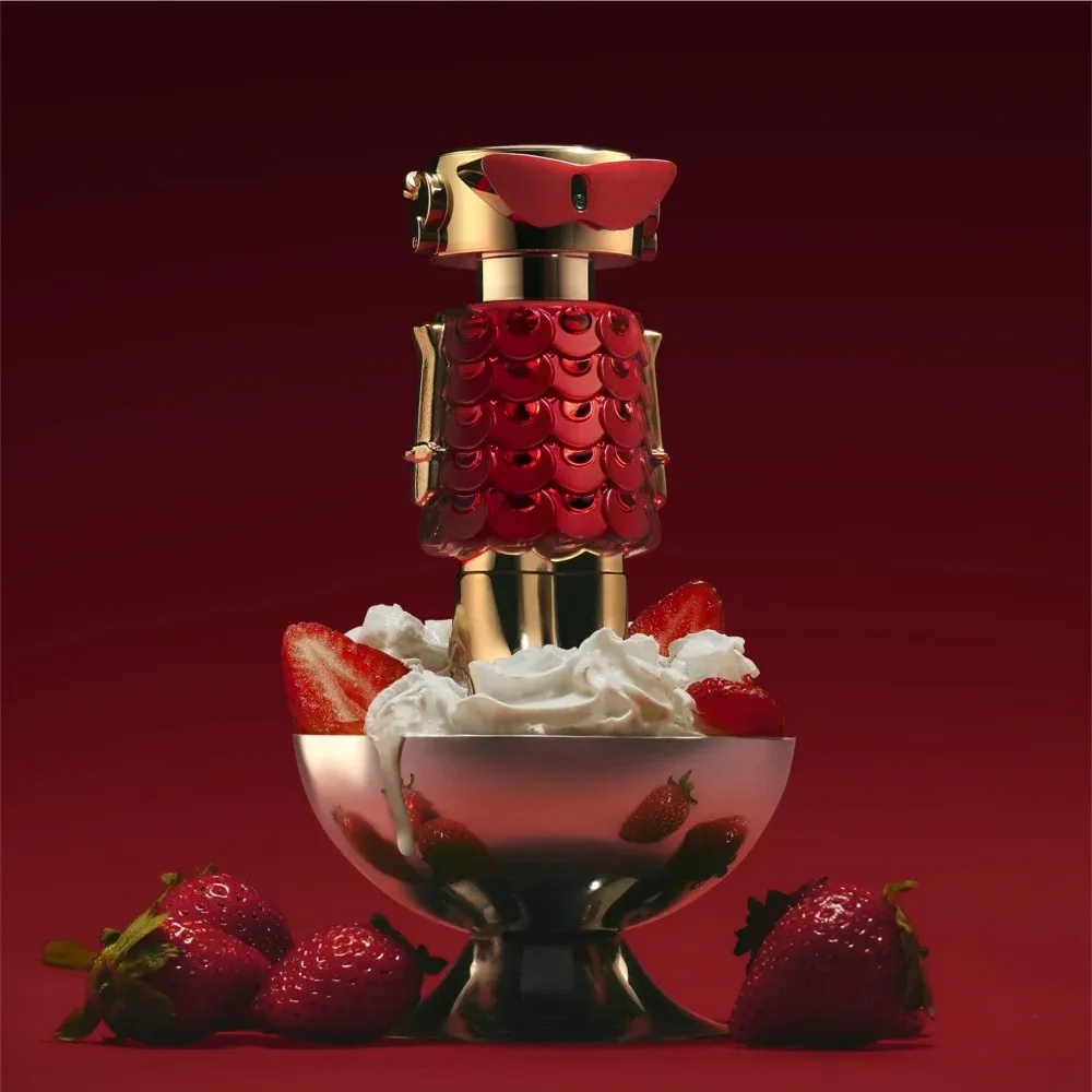 Rabanne Fame In Love product photo: crimson, gold and deep burgundy, metal and plastic, dramatic light, image 2 of 3