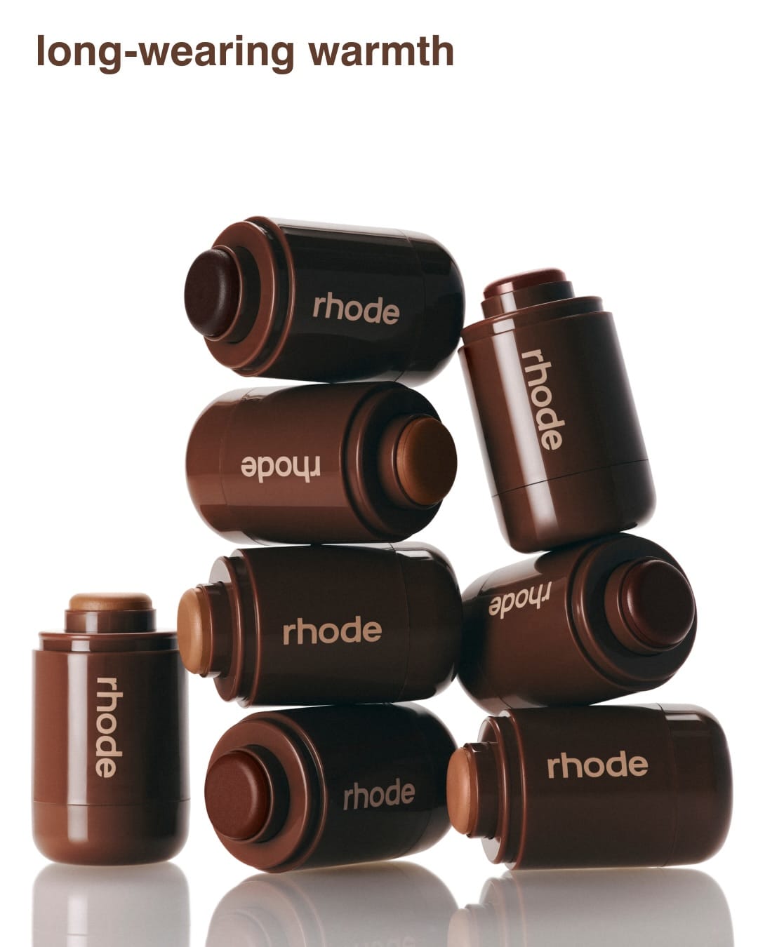 Rhode Skin product photo: espresso brown, bronze and tan, plastic, soft light