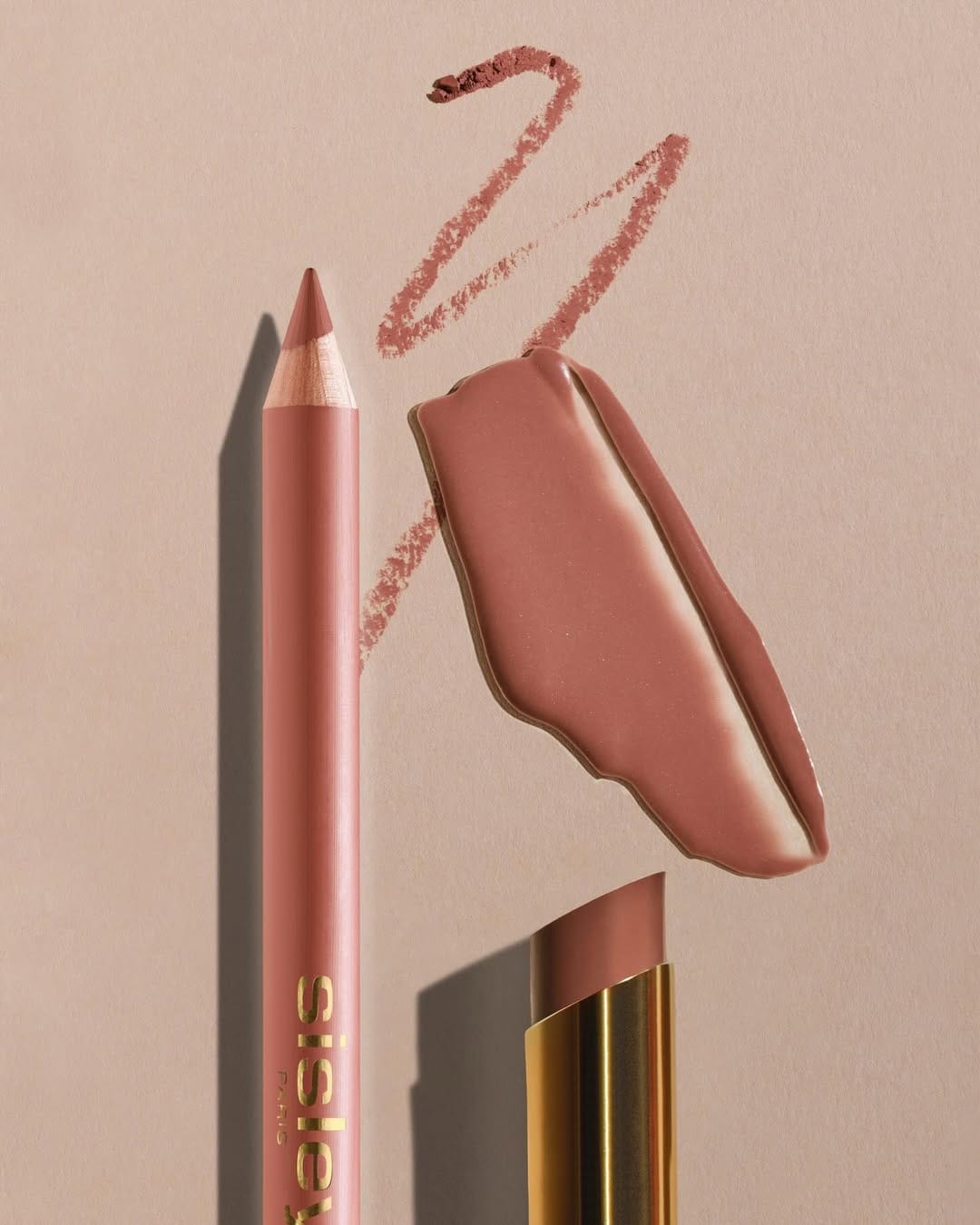 Sisley Paris lipstick product photo: gold, poppy red, chocolate brown and rosewood, metal, soft light, image 4 of 6