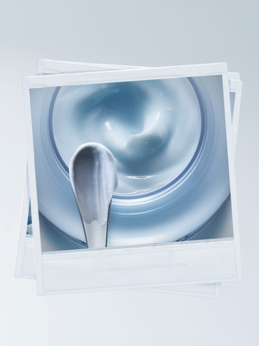 Torriden skincare product photo: hyaluronic blue and frosted clear, glass, soft light, image 5 of 6